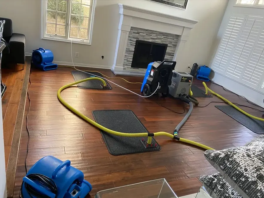 Air movers drying a water damaged Pasadena room